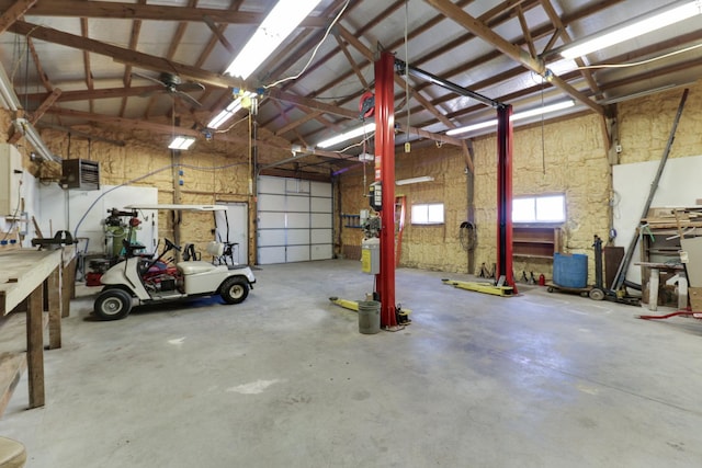 garage featuring a workshop area