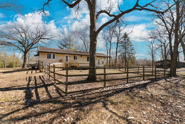 exterior space featuring a fenced front yard