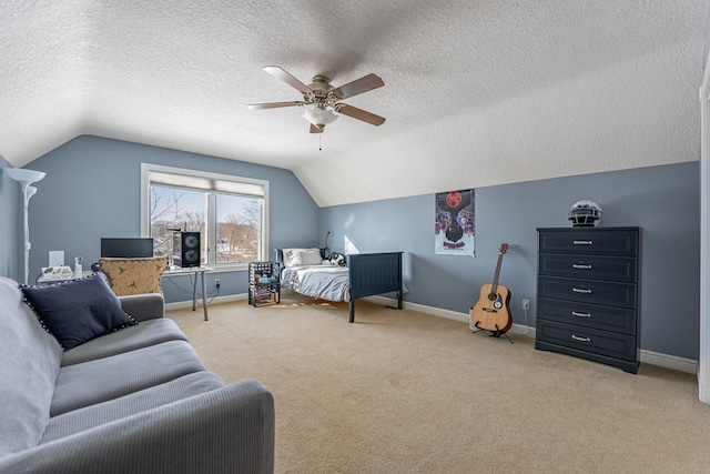 bedroom featuring lofted ceiling, light colored carpet, a ceiling fan, a textured ceiling, and baseboards