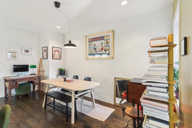 dining area featuring dark wood-type flooring, recessed lighting, and baseboards