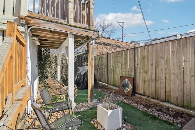 view of yard with a fenced backyard