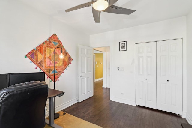 office featuring ceiling fan, baseboards, and wood finished floors