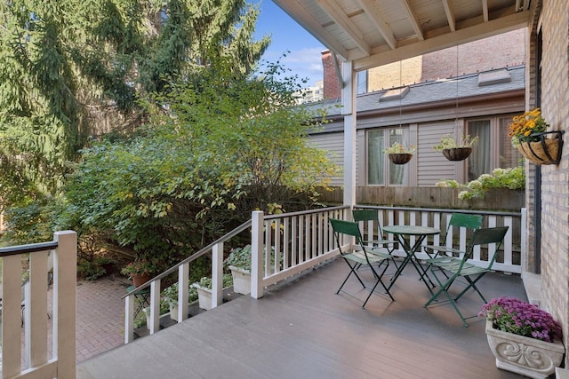 deck featuring outdoor dining area