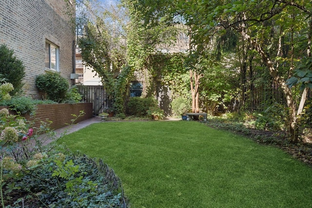 view of yard with fence