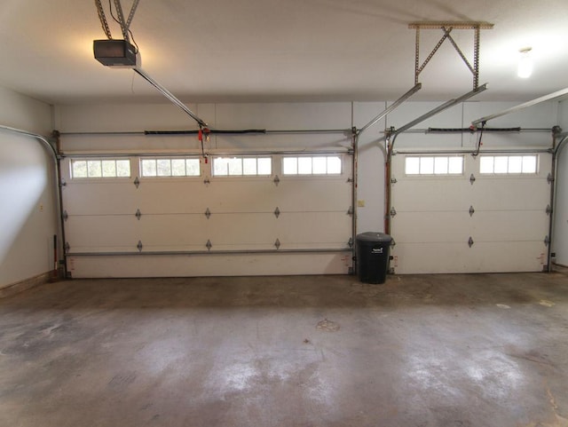 garage featuring a garage door opener