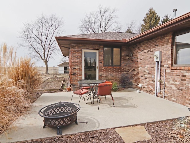 view of patio / terrace featuring a fire pit and outdoor dining area