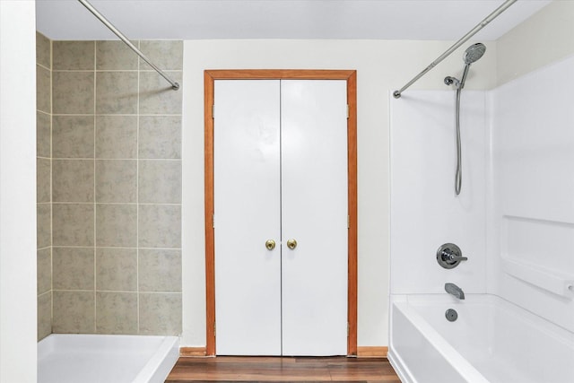 1001 E Sunnycrest Dr, Urbana, IL 61801 - full bath featuring  shower combination and wood finished floors