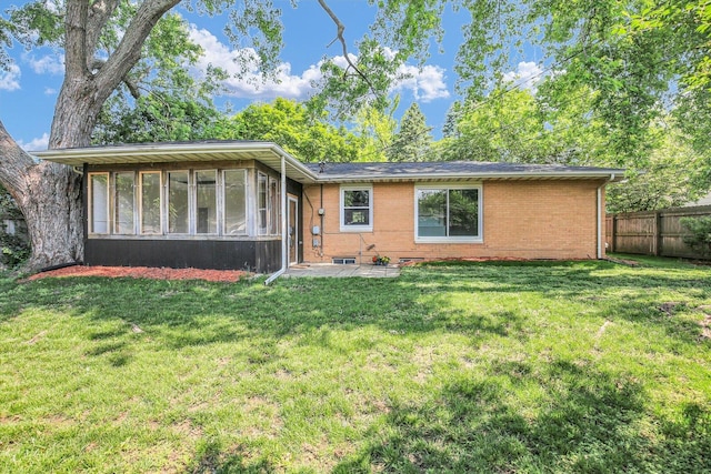 1001 E Sunnycrest Dr, Urbana, IL 61801 - view of front of property with a sunroom and brick siding