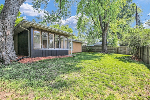 1001 E Sunnycrest Dr, Urbana, IL 61801 - view of yard featuring a sunroom