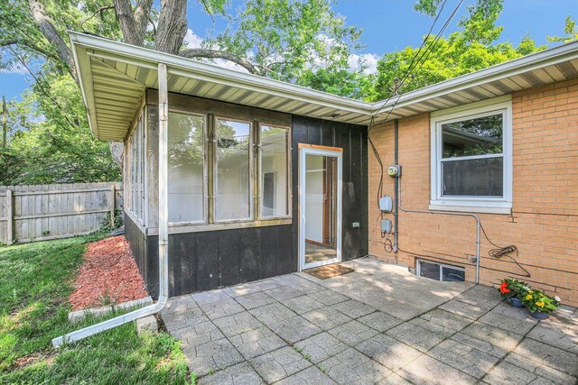 1001 E Sunnycrest Dr, Urbana, IL 61801 - entrance to property featuring a patio and brick siding