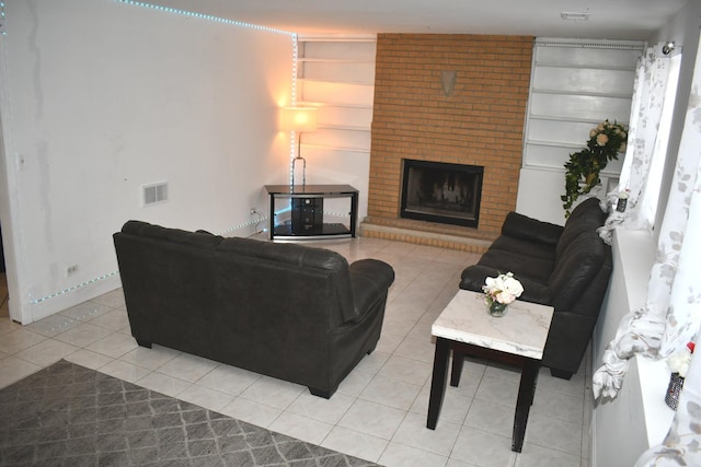 1080 Redondo Dr, Romeoville, IL 60446 - living area with light tile patterned flooring and a brick fireplace