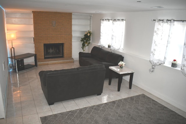 1080 Redondo Dr, Romeoville, IL 60446 - living area featuring light tile patterned floors and a fireplace