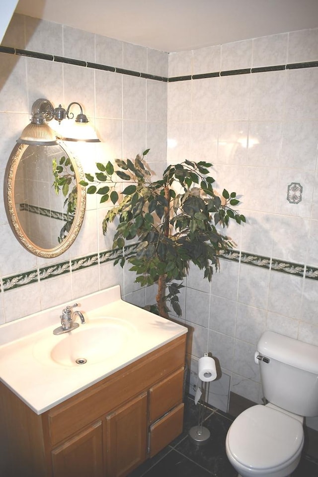 1080 Redondo Dr, Romeoville, IL 60446 - bathroom featuring tile walls, vanity, and tile patterned flooring