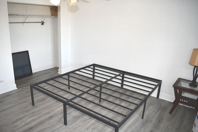 1080 Redondo Dr, Romeoville, IL 60446 - unfurnished bedroom featuring wood finished floors and a closet