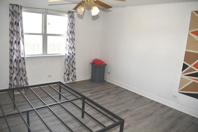 1080 Redondo Dr, Romeoville, IL 60446 - unfurnished bedroom with wood finished floors and ceiling fan