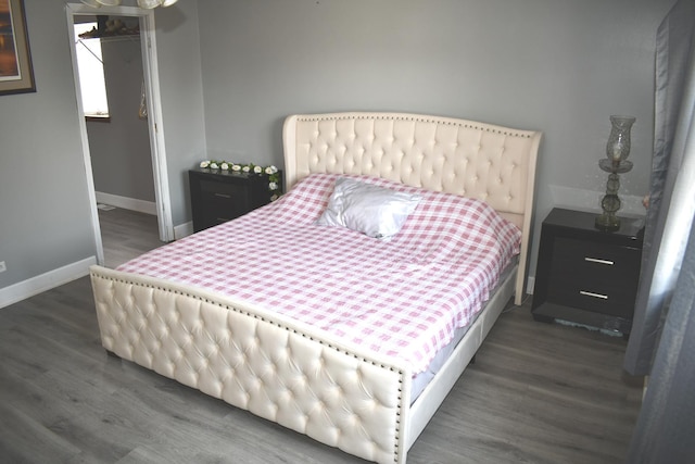1080 Redondo Dr, Romeoville, IL 60446 - bedroom featuring dark wood-style flooring and a closet