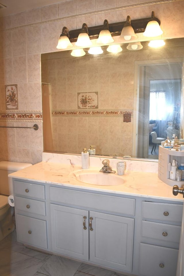1080 Redondo Dr, Romeoville, IL 60446 - bathroom with tile walls and vanity