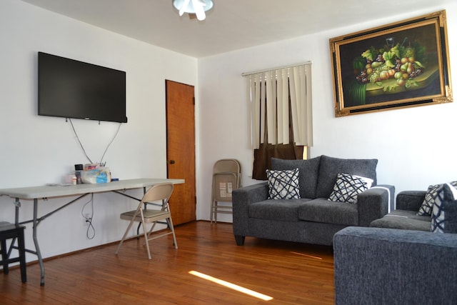 living area with dark wood-style floors