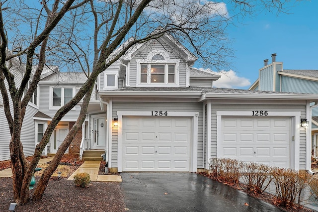 view of front of house featuring a garage and driveway