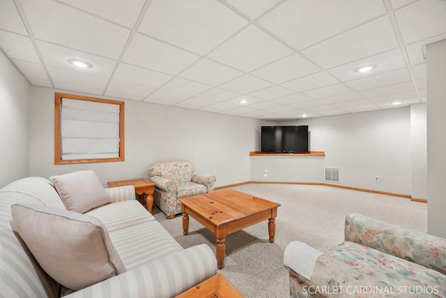 living area with recessed lighting, baseboards, visible vents, and carpet floors