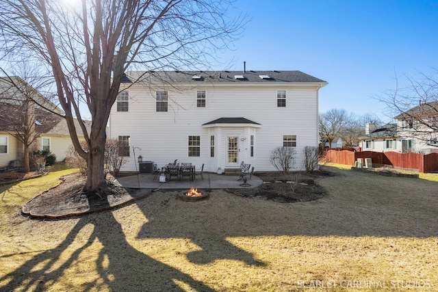 back of property with cooling unit, a patio, and fence