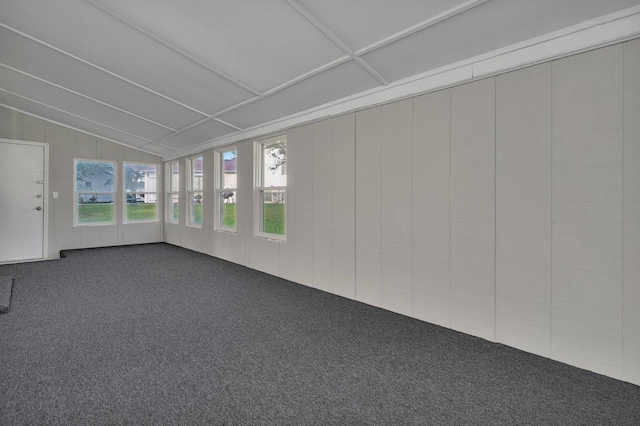 unfurnished sunroom with vaulted ceiling