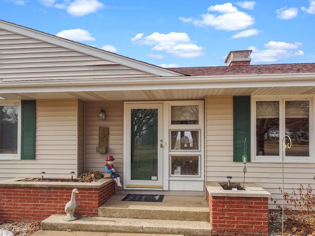 entrance to property with a porch