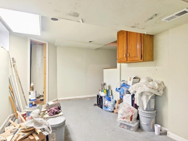 interior space featuring visible vents and baseboards