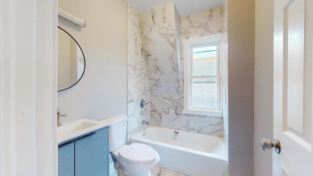 bathroom with toilet, tub / shower combination, and vanity