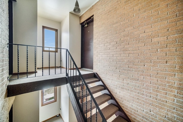 stairs with brick wall