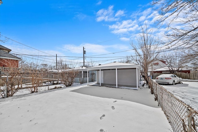 exterior space with fence and an outdoor structure