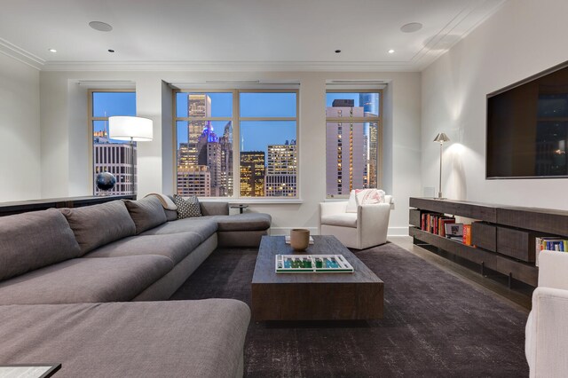 living room featuring ornamental molding, recessed lighting, and baseboards