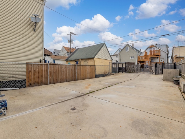 view of patio / terrace featuring a residential view and fence