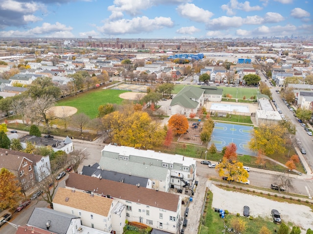 birds eye view of property with a residential view