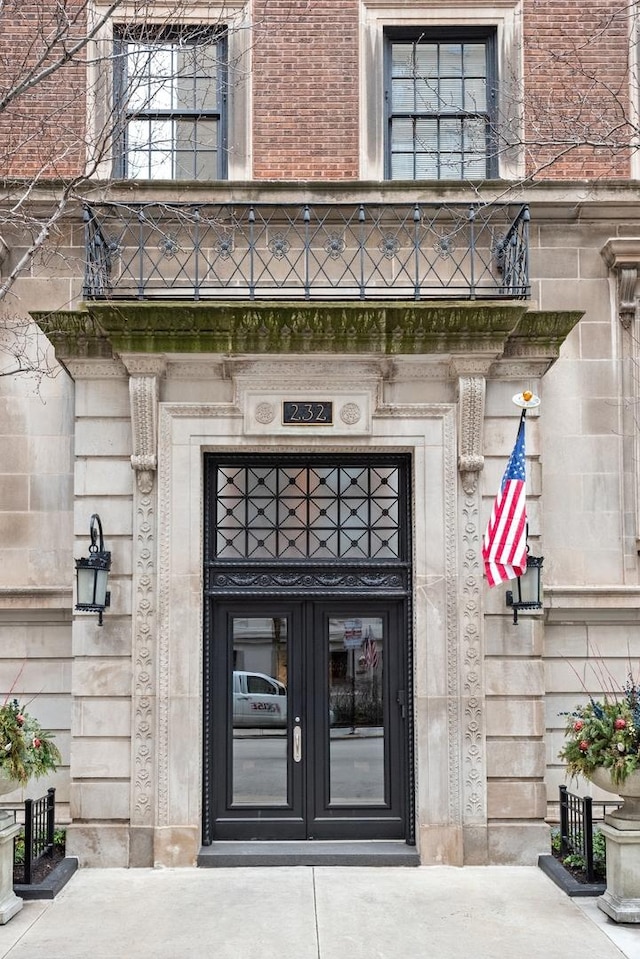 entrance to property featuring french doors