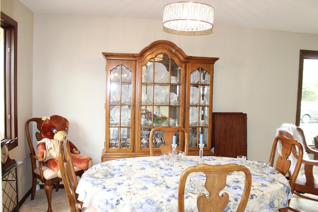 dining area featuring carpet flooring