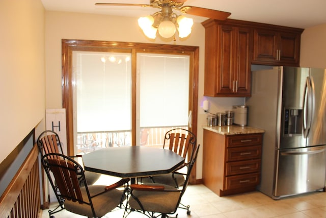 dining space featuring a ceiling fan