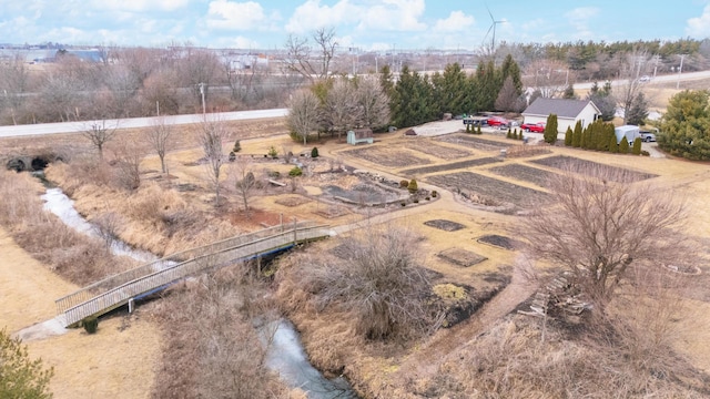 birds eye view of property featuring a rural view