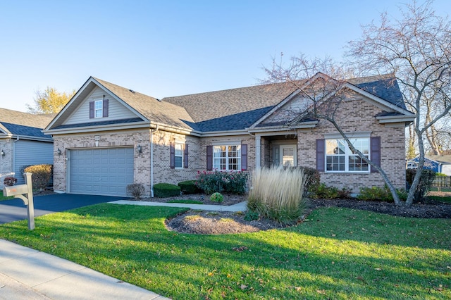 view of front facade with aphalt driveway, brick siding, a shingled roof, and a front lawn