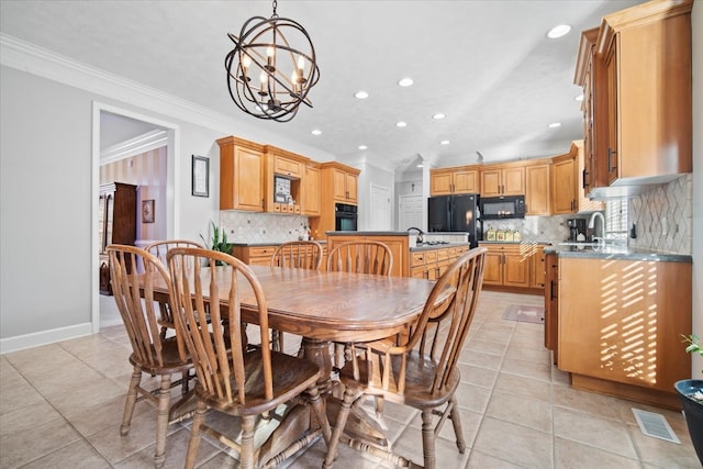 dining area with recessed lighting, ornamental molding, light tile patterned flooring, a chandelier, and baseboards