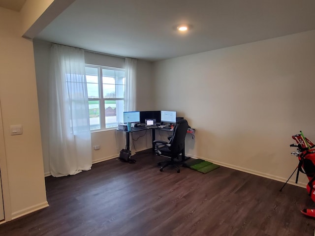 office space featuring dark wood-style floors and baseboards