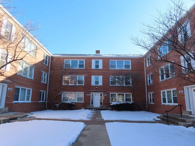 view of snow covered property