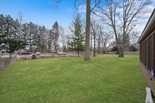 view of yard with fence