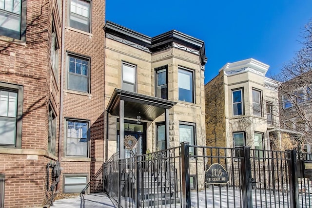 view of front of property with fence