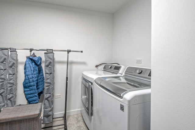 laundry area with laundry area and washer and dryer