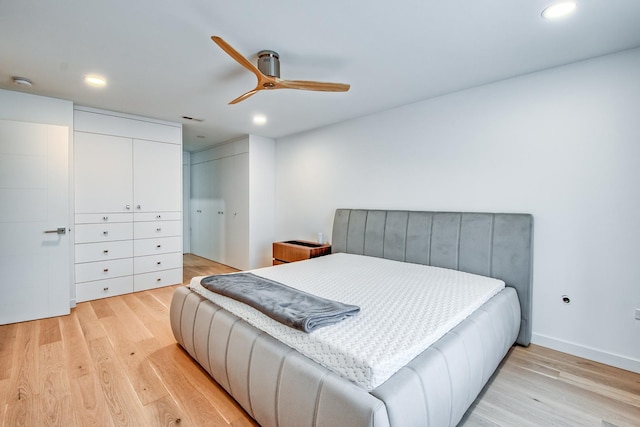 bedroom featuring recessed lighting, visible vents, ceiling fan, and light wood-style flooring