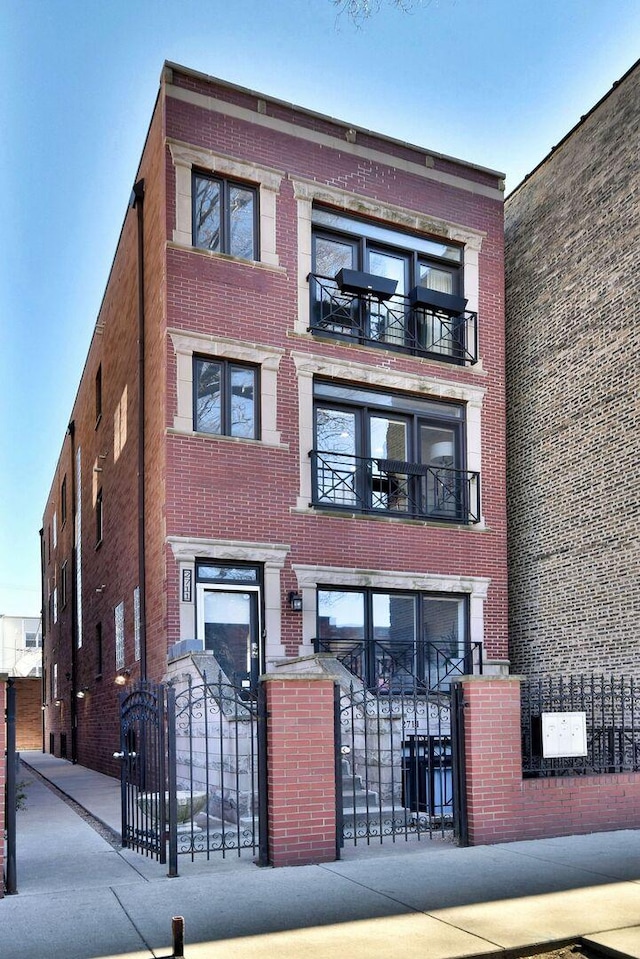 view of building exterior featuring fence