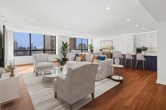180 E Pearson St Unit 4606, Chicago, IL 60611 - living area featuring recessed lighting, plenty of natural light, wood finished floors, and a city view