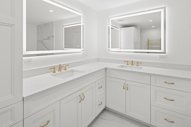 180 E Pearson St Unit 4606, Chicago, IL 60611 - bathroom featuring recessed lighting, marble finish floor, a sink, and double vanity
