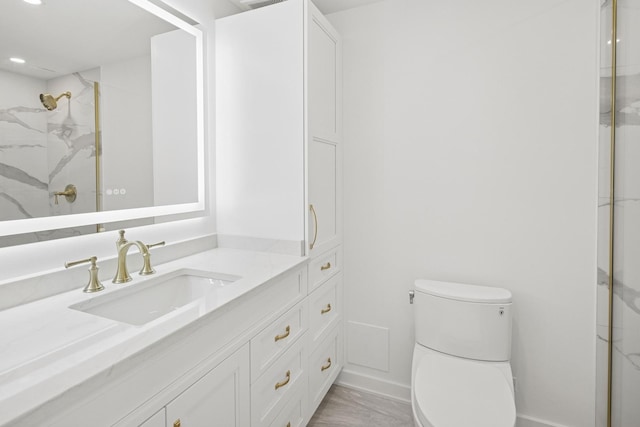 180 E Pearson St Unit 4606, Chicago, IL 60611 - bathroom with toilet, a marble finish shower, visible vents, and vanity